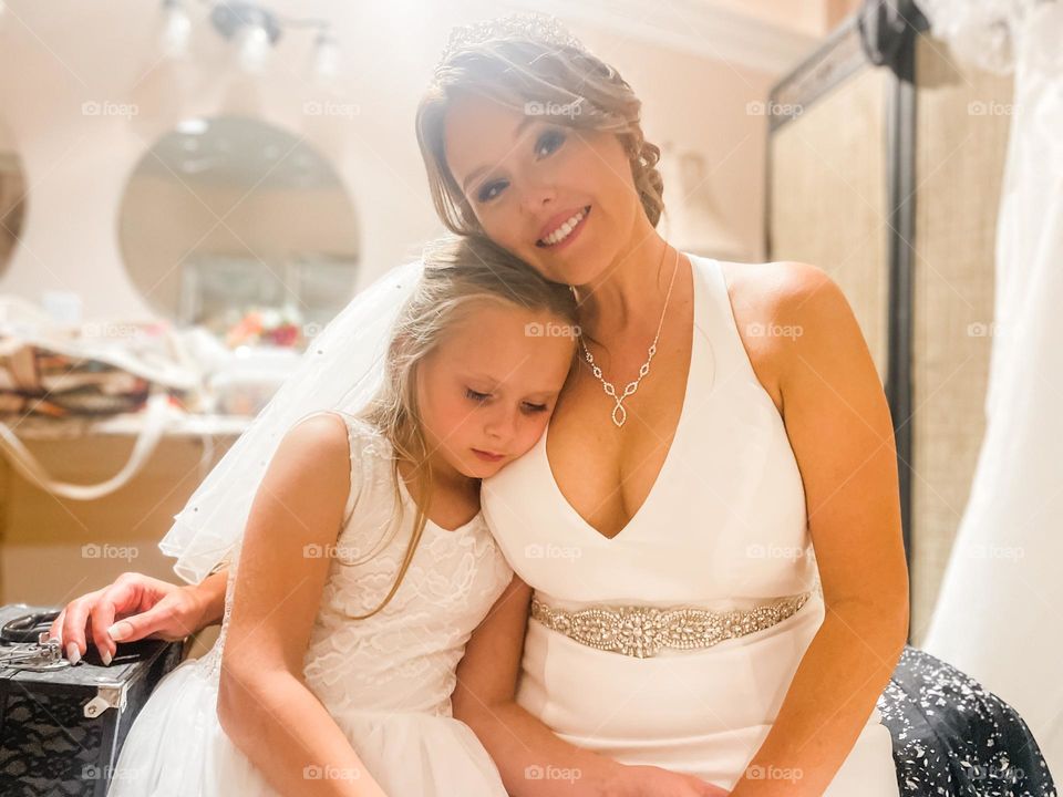 A bride and her daughter on her wedding day 