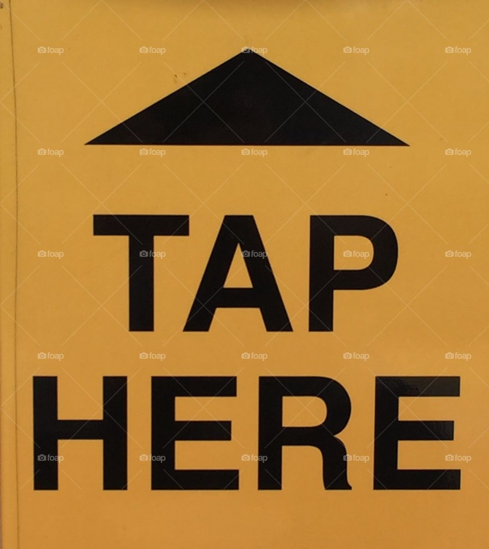 Tap here sign