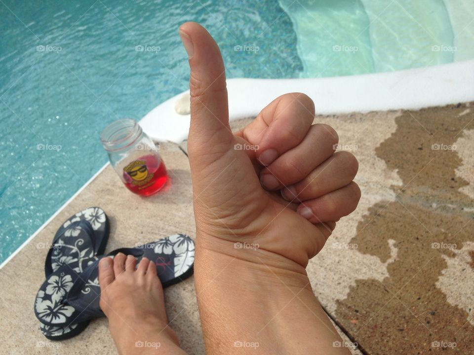 Flipflops off drink in hand sun on my shoulder... Just relaxing!