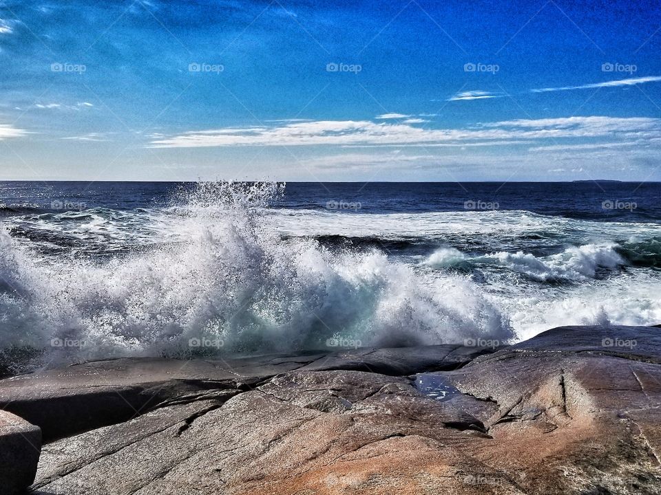 Huge waves crashing at Peggy's Cove in windy Nova Scotia