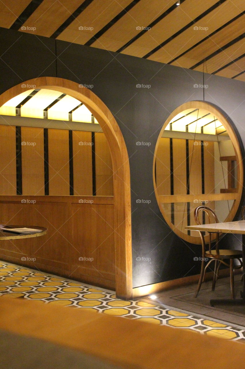 A coffeshop corner with big circle window