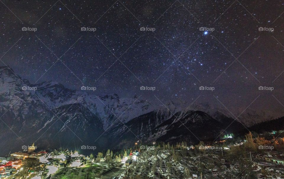 when you have both...starry skies and snow capped mountains...signs of winter