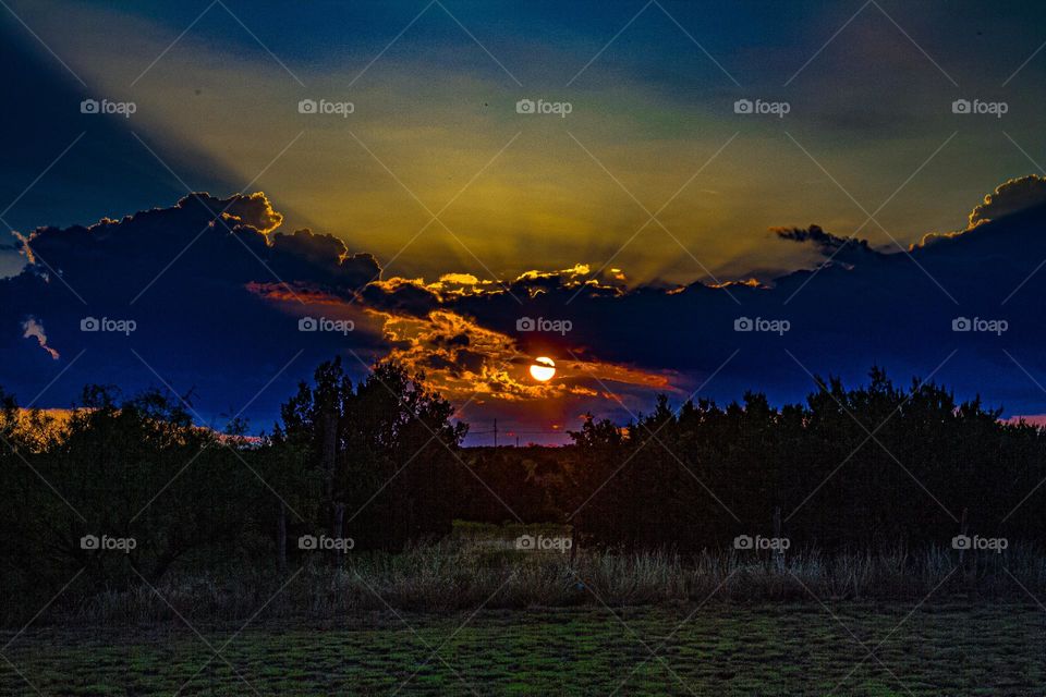 sun setting seen from a rest stop in the Texas panhandle