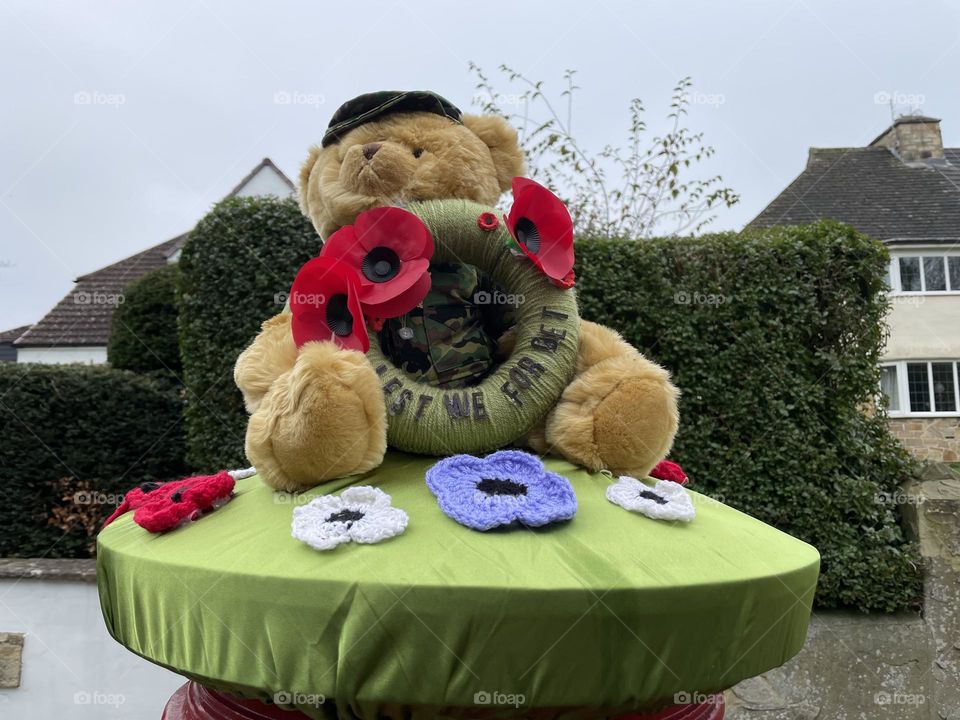 Teddy bear sat on top of a postbox wearing an army uniform … Lest we forget … wear your poppy with pride 