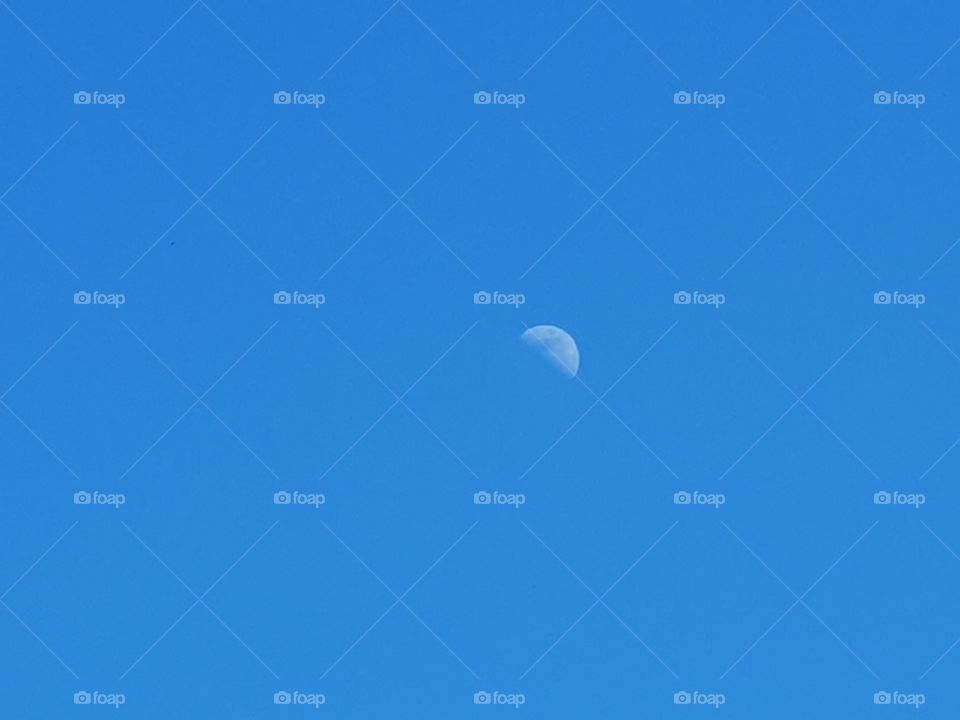 The moon and the blue sky