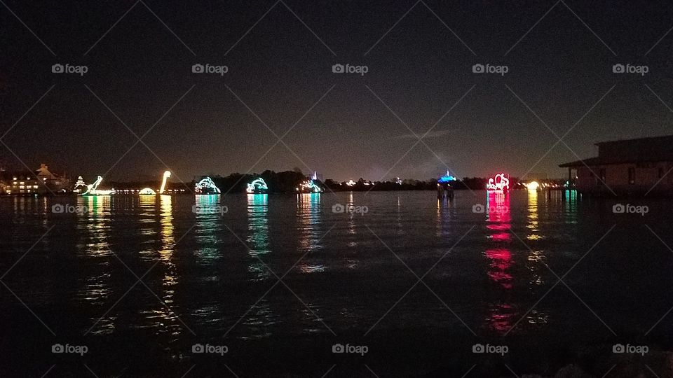 Viewing Disney Electrical water Pageant from the beach at of the Polynesian Resort