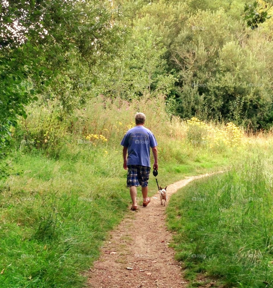 Man walking his dog. One man & his dog.....