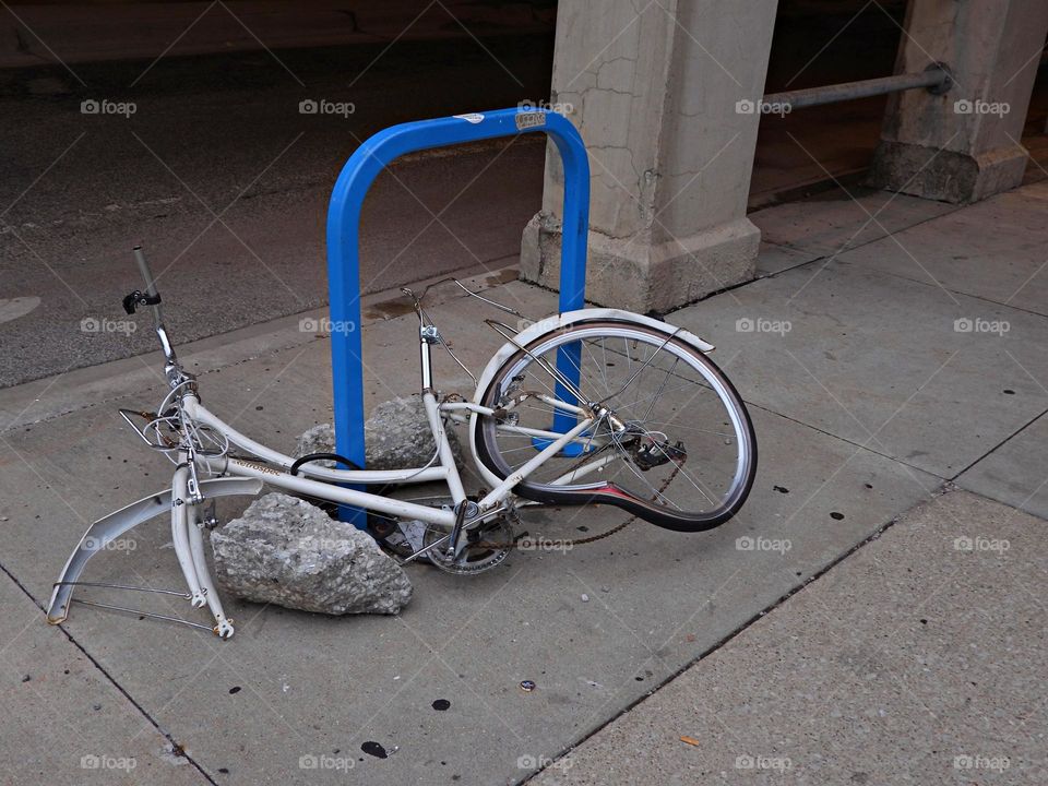 One Lonely Bicycle - One Really LONELY Bicycle took a fatal smack down while still chained up