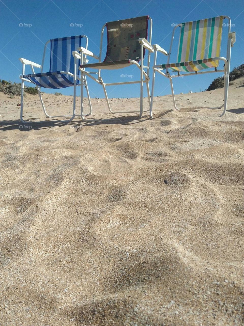 A chairs on beautiful sand at essaouira in Morocco