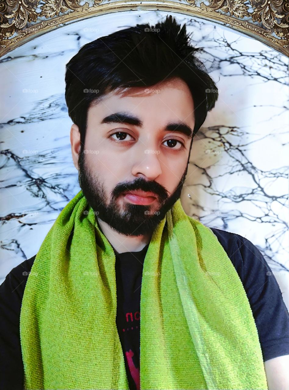 Selfie taken by a boy in the bathroom before his bath.