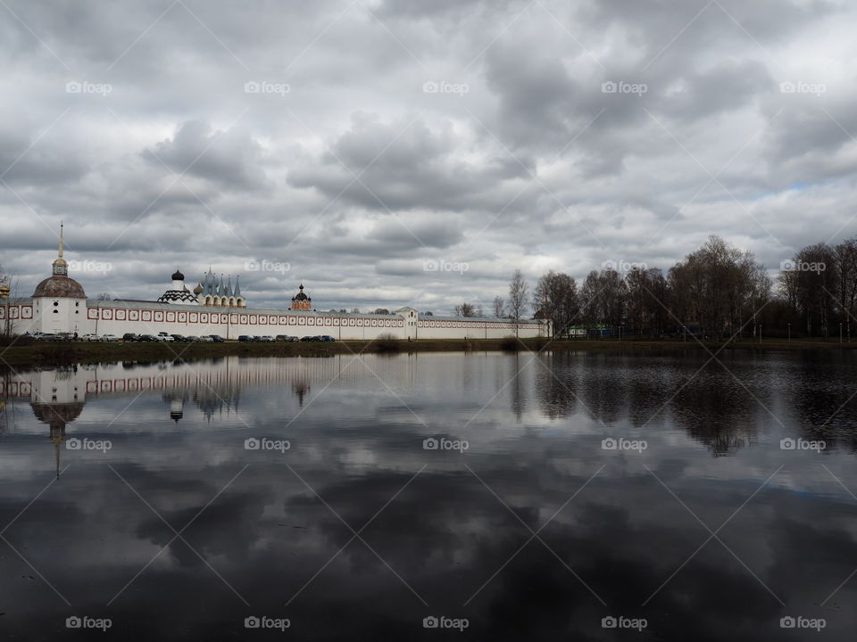Lake. Clouds. Reflections. Monastery. Wall. Churches