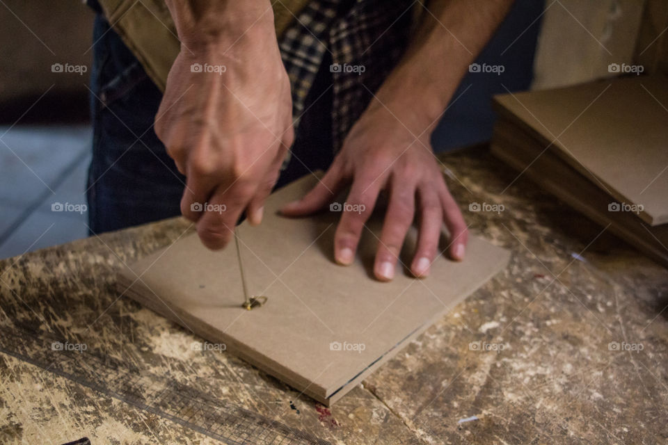 A man is working with frames