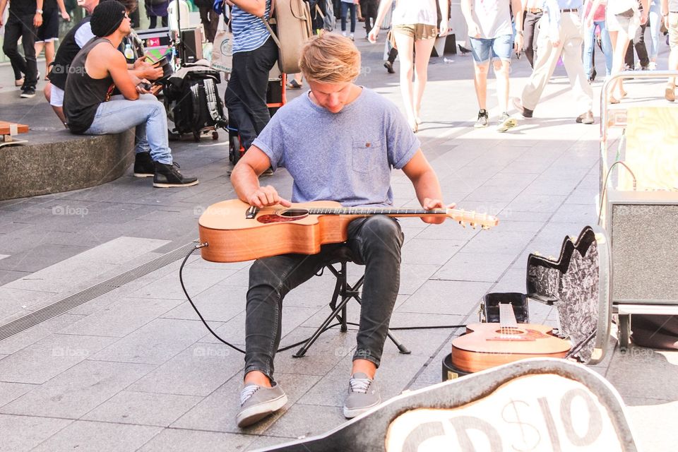 The busker. His talent goes further than just playing a guitar 