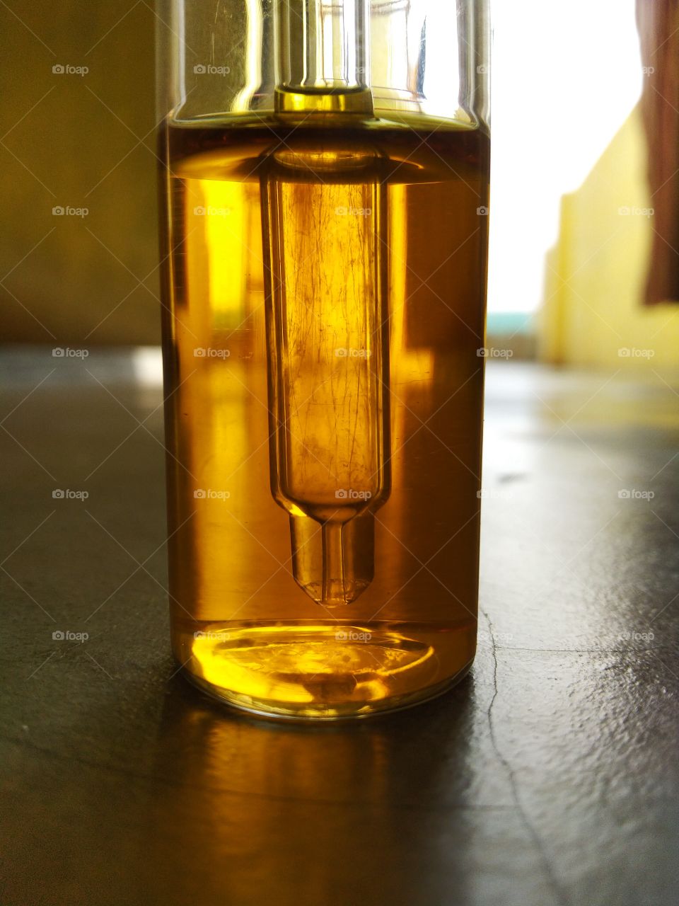 Glass bottle contains liquid chemical