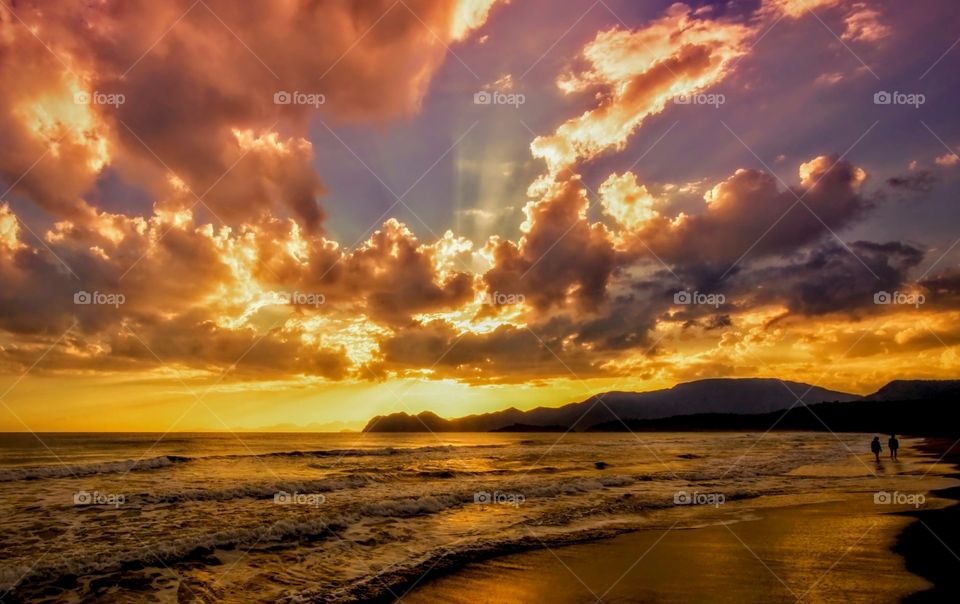 Sunset stroll along the beach