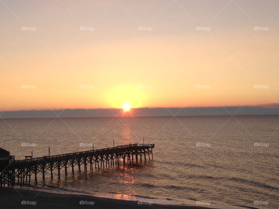 Myrtle memories. Myrtle Beach sunrise after the rains the caused lots of damage