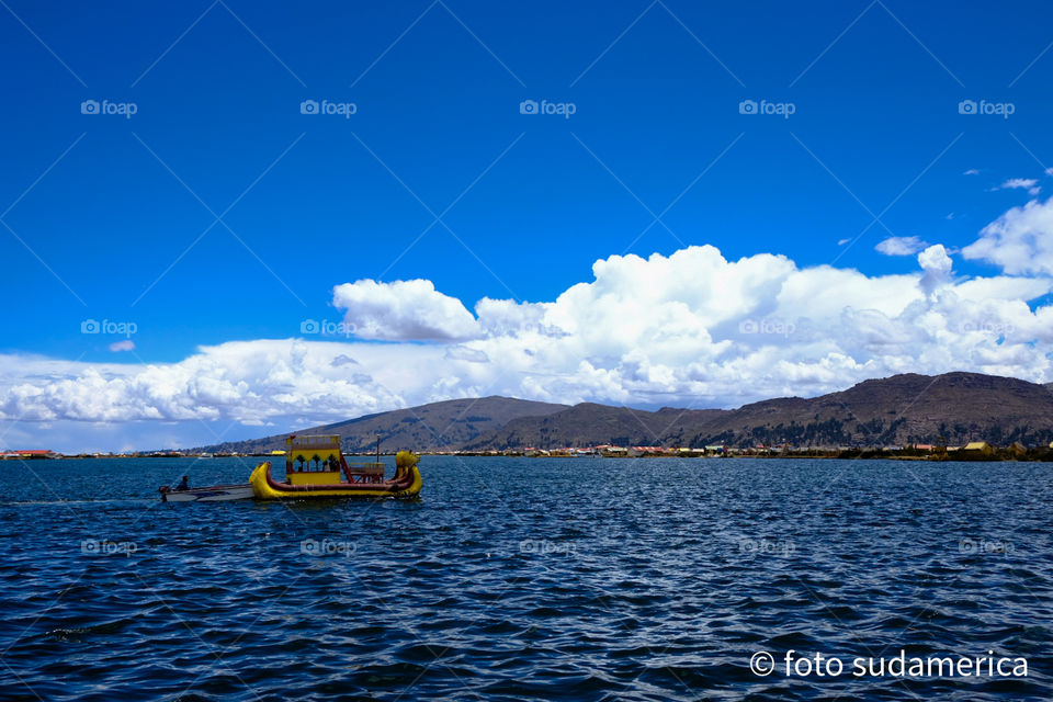 Tourist boat sailing on the titicaca lake in peru