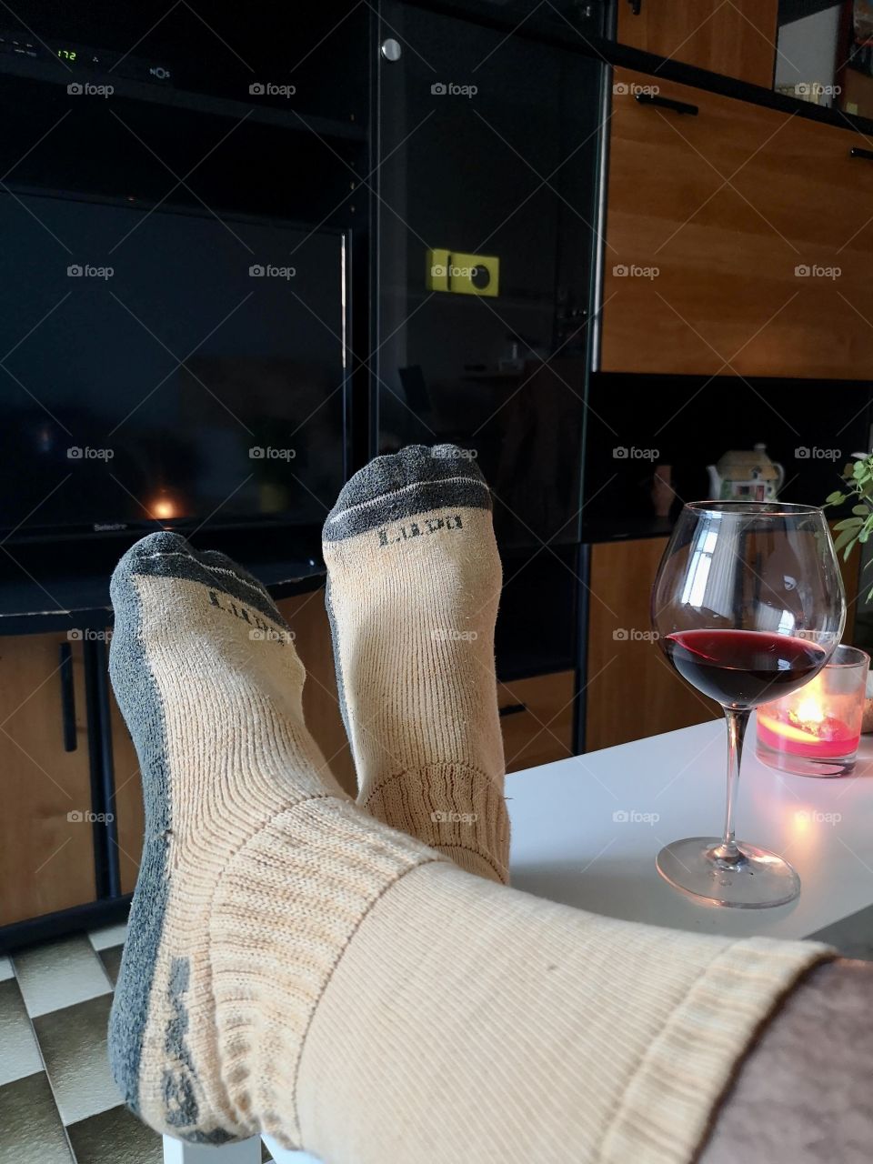 Drinking wine with socks on autumn night