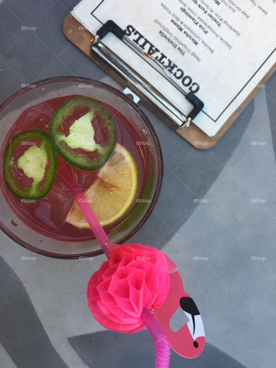 Flamingo and Cocktails on grey tables 