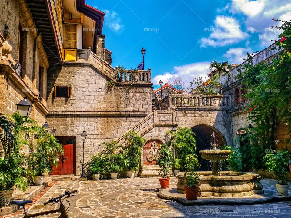Capturing the trace of history, memory & race in the hot noon sun and humid breeze.

Casa Manila Patio in Intramuros which is the old city of Manila during the Spanish Era in the Philippines.