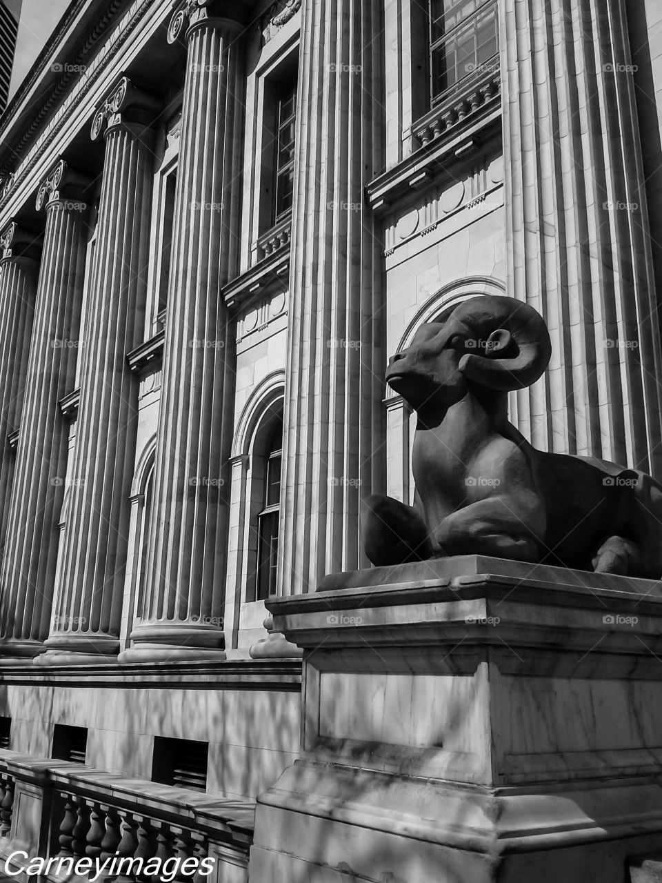 Stone ram with columns. Bryron White building in Denver