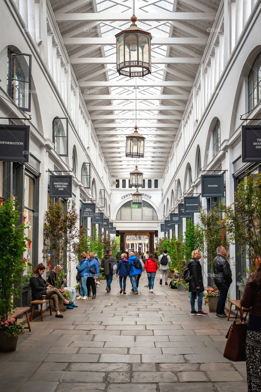 People shopping in Covent Garden Market. London. UK.