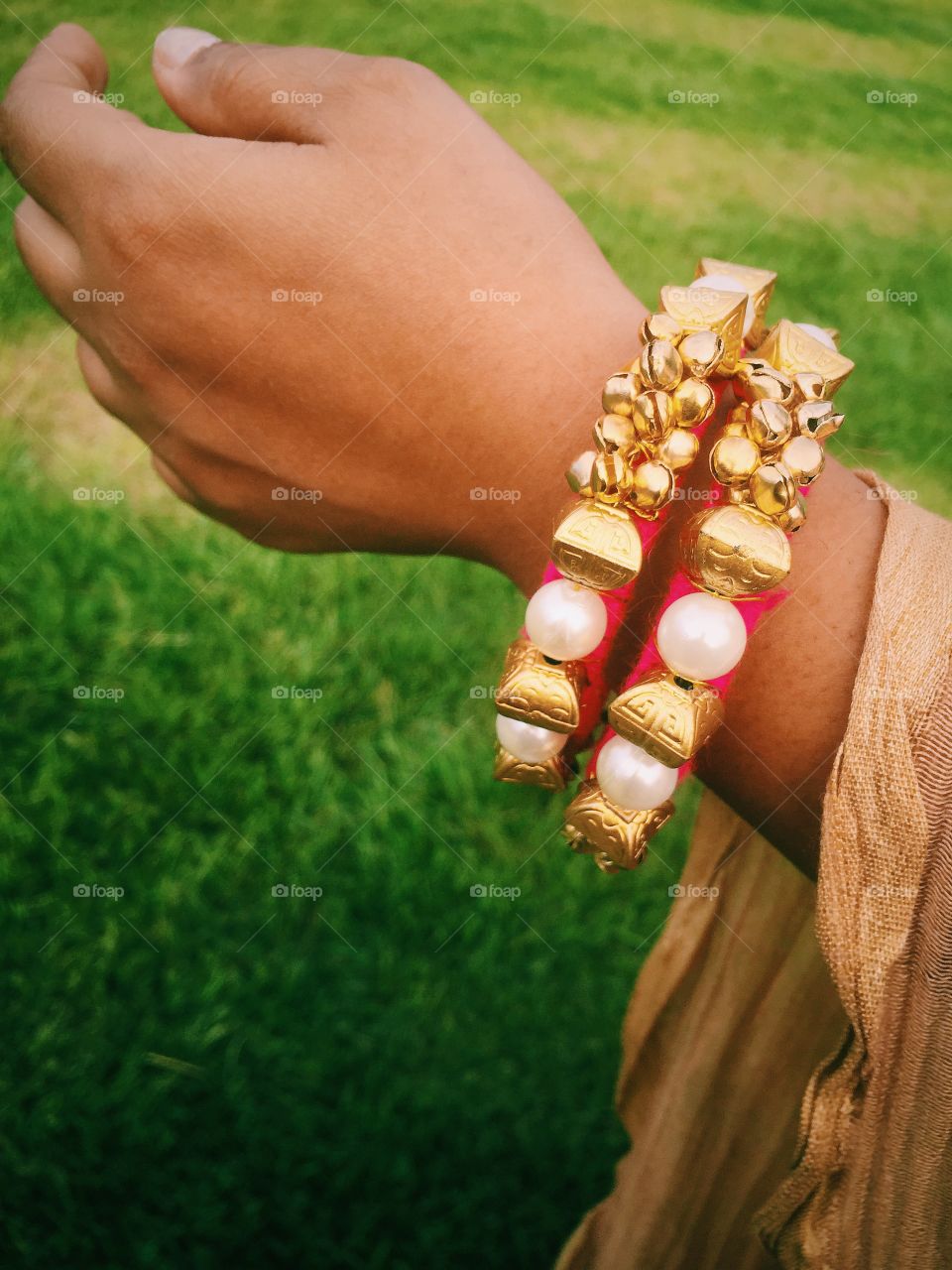 Hand made bracelet from metallic beads threads 