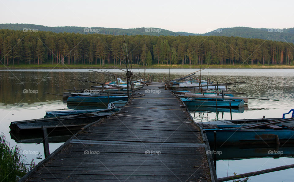 Scenic view of boats moored on lake