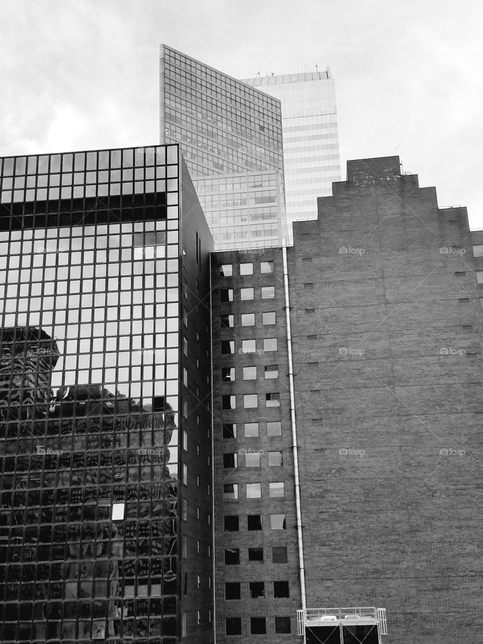 A black and white tribute to most famous cityscape in the world seen from the 30th floor balcony of the Kimberly Hotel.