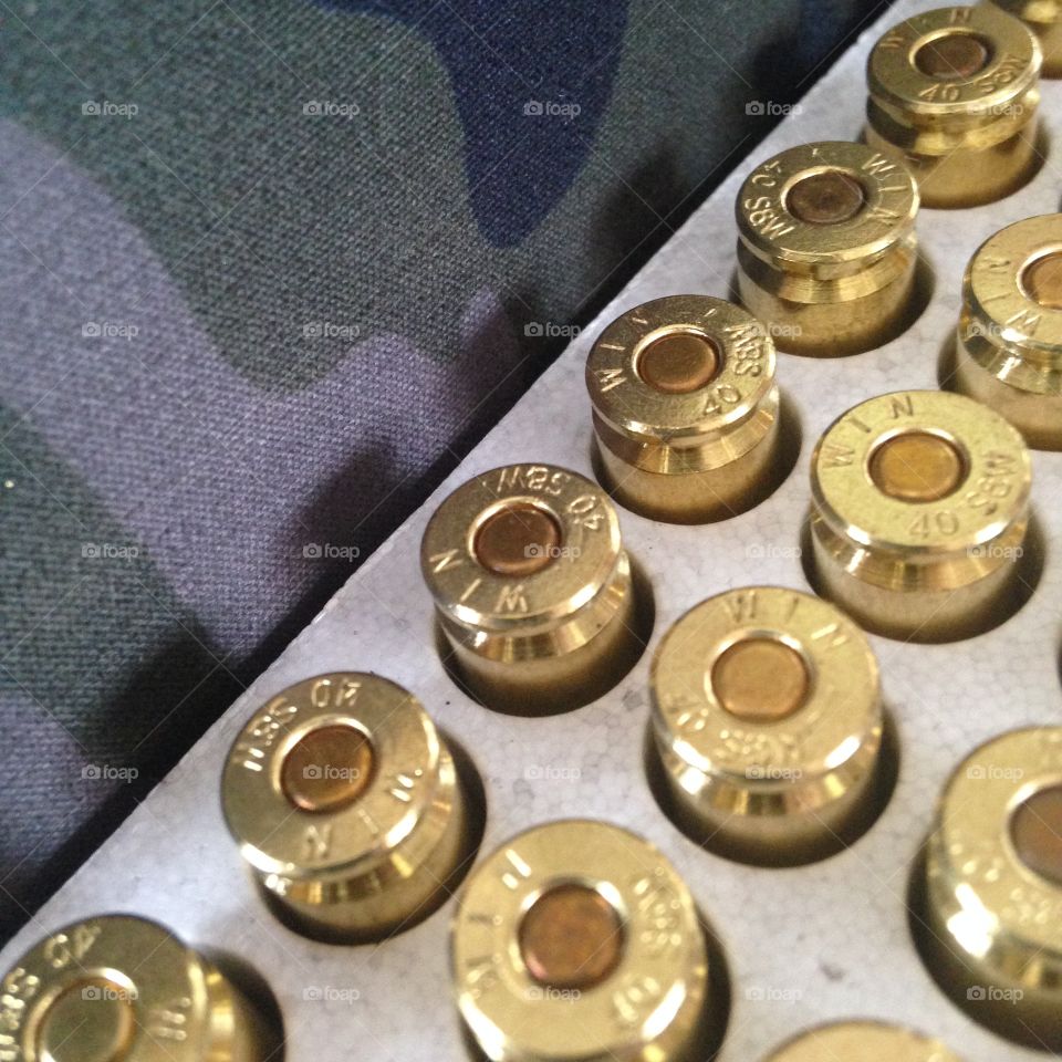 Bullets against a camouflage background