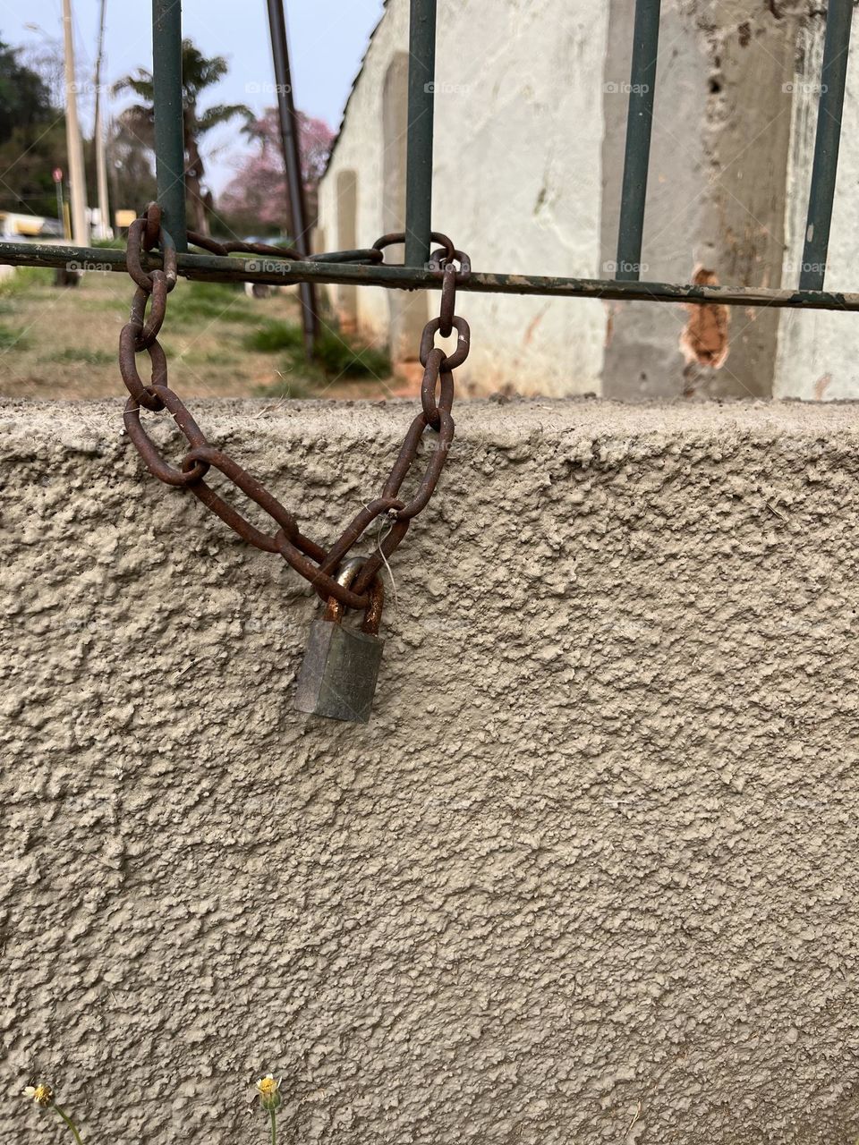 A padlock in a chain not closing anything 