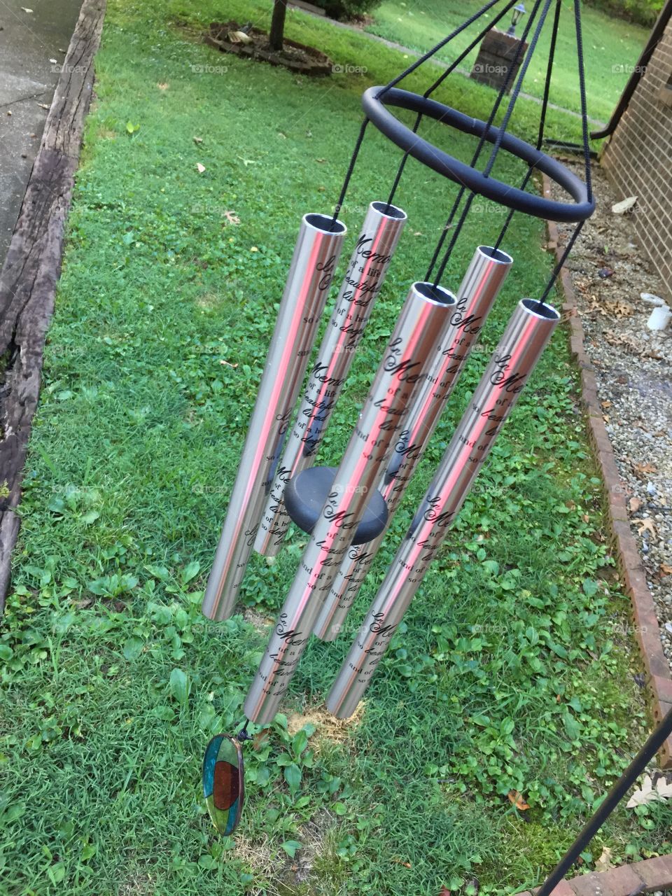 Tint of red on the beautiful wind chimes in the sunset