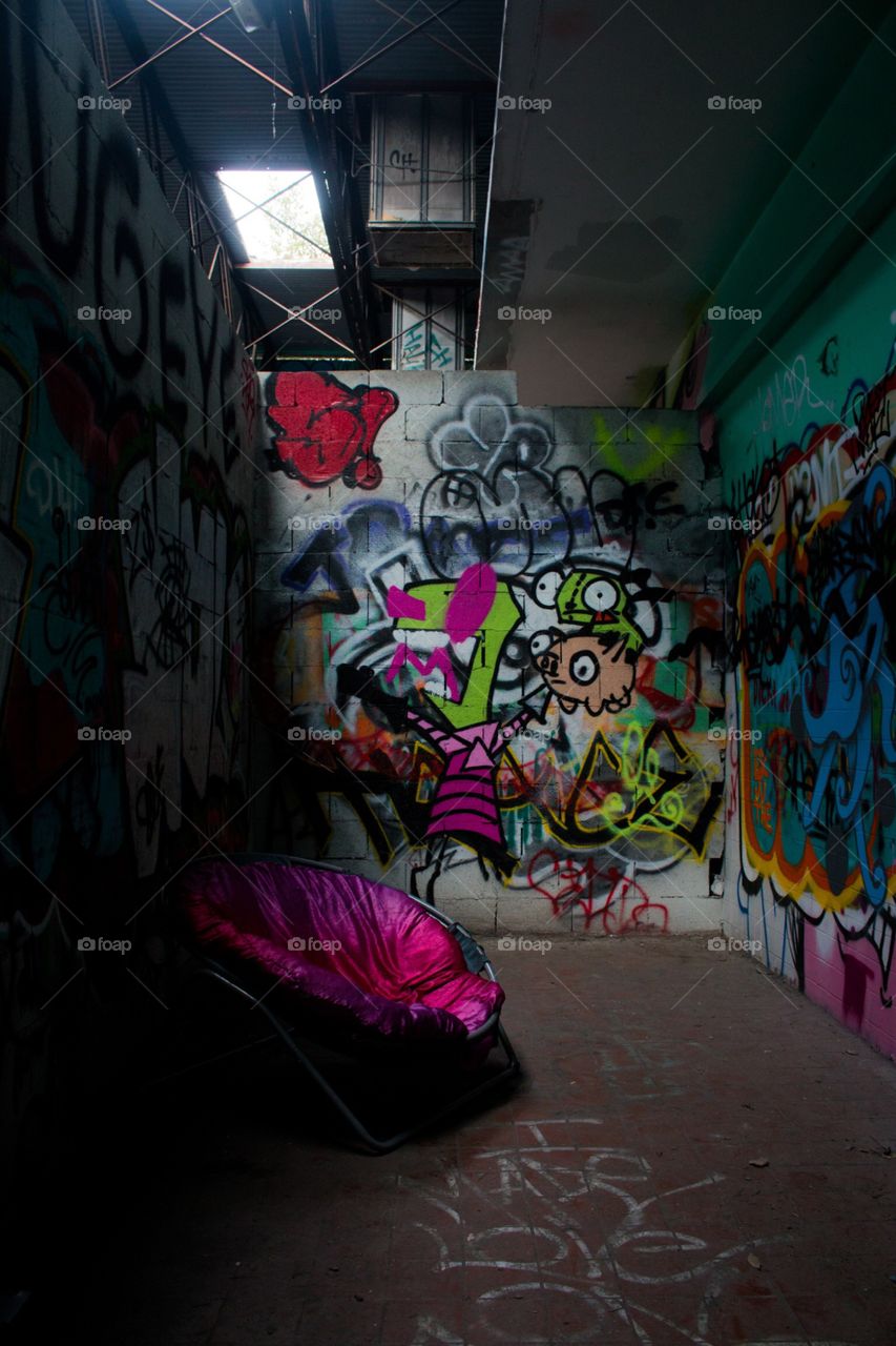 Abandoned graffiti lounge room