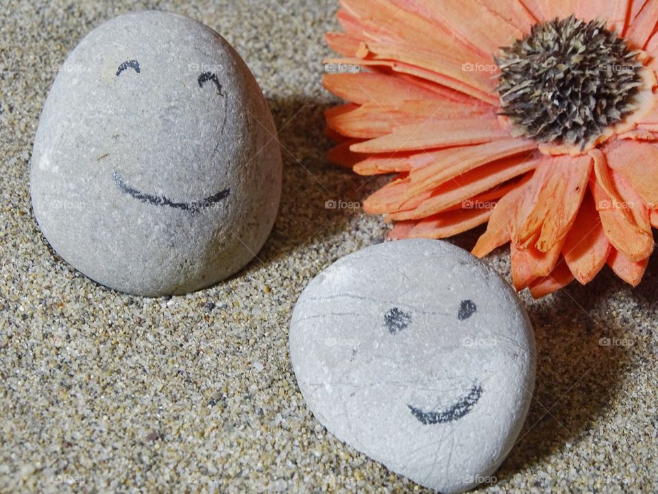 The stones of my son also smile.