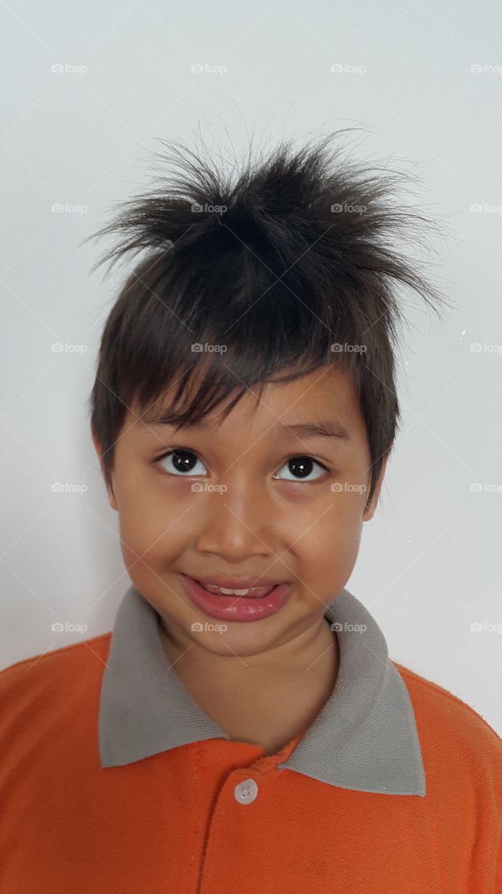 kid with funny hairstyle