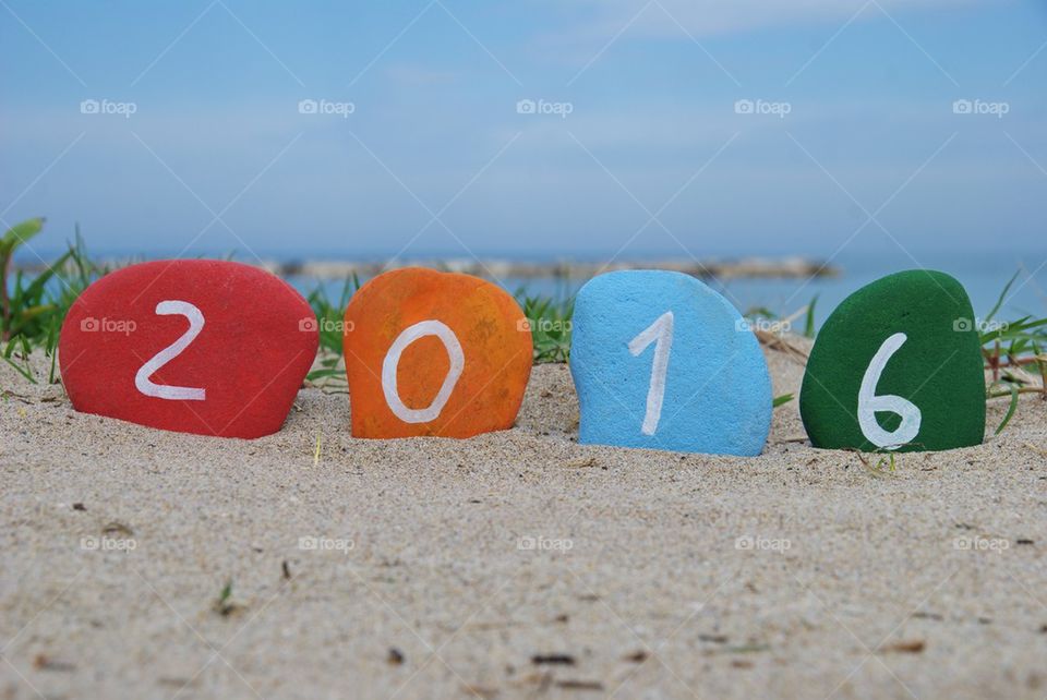 Happy 2016 on colourful stones