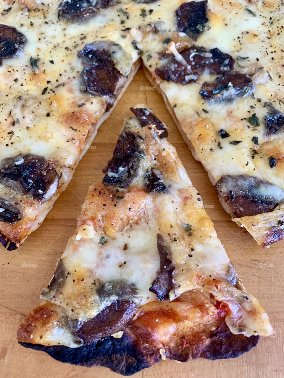 Thin crust mushroom pizza