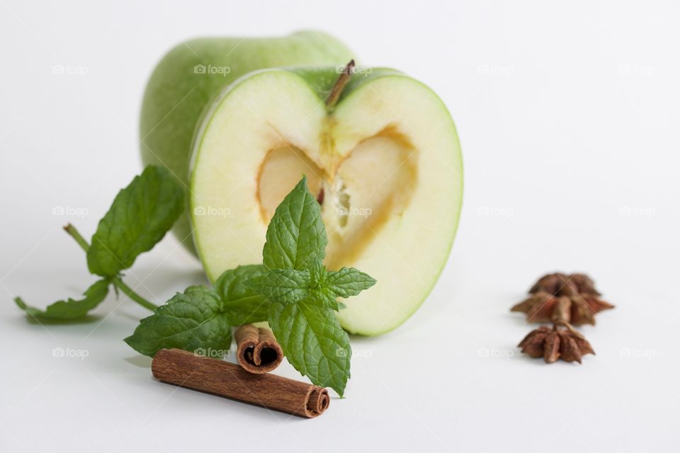 Green apple with mint leaf and spices