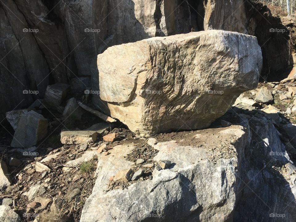 Huge boulder dropped in the high mointains 