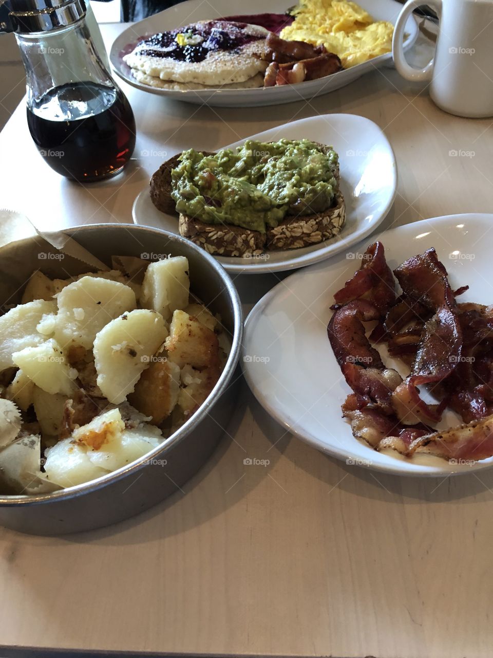 Bacon, potatoes and guacamole toast from one of the best breakfast spots in New Jersey: Cafe 72. 
