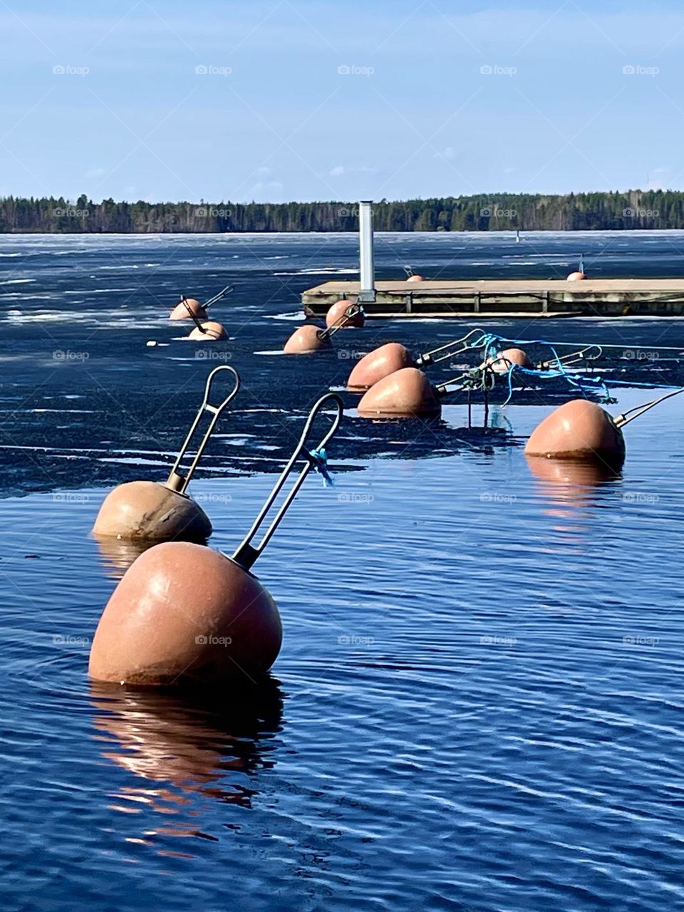 Ice is melting at Haukivuori harbour in Mikkeli, Finland