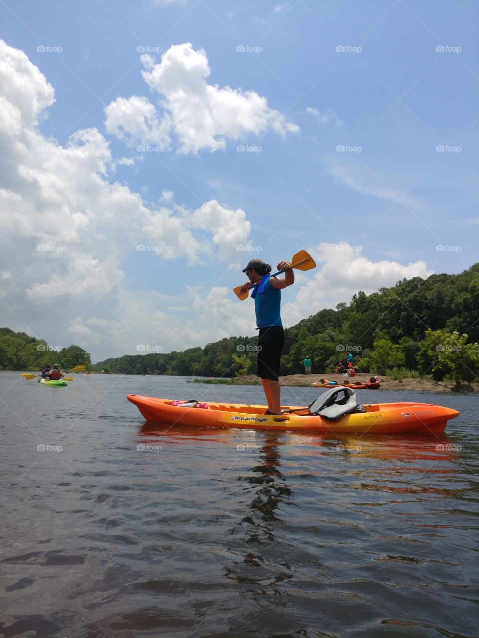 Kayaking on a beautiful day at the Coosa river while my friend shows off.