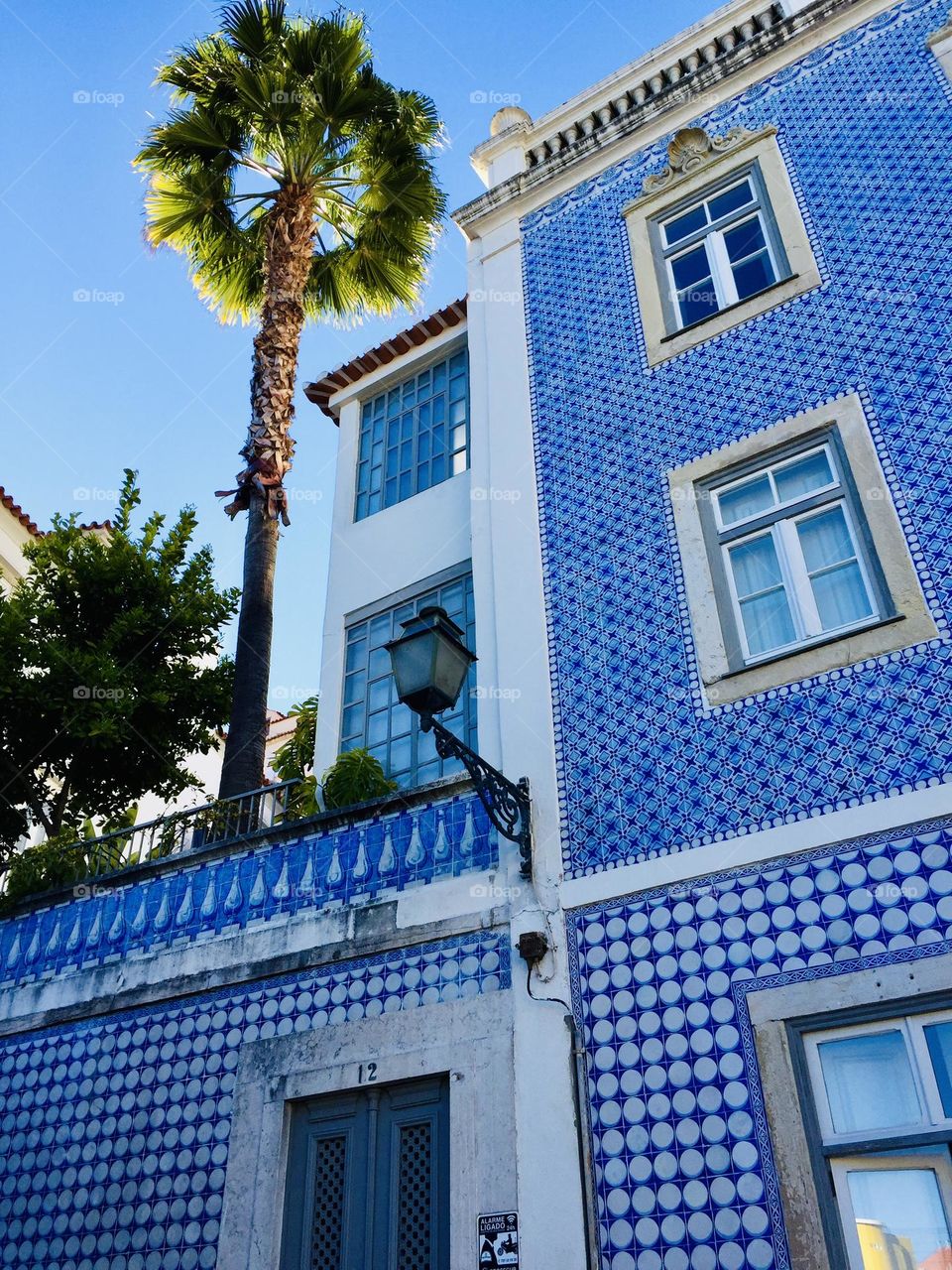 Lisbon, Portugal, low angle view of typical buildings tiled with famous azulejos ceramic tiles 