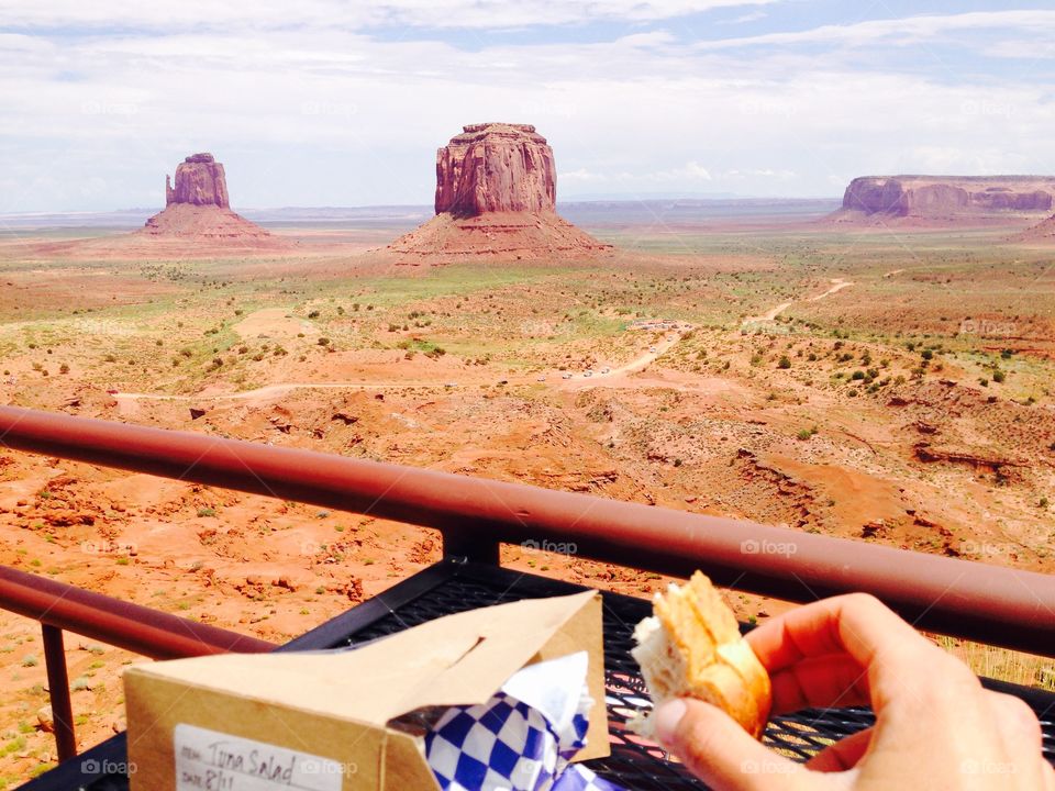 Eating a sandwich under the Sun at the Monument  valley tribal park 