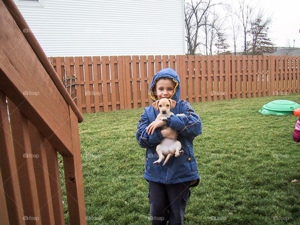 Two Peas in a Pod- my son and our family pet, Honey. 