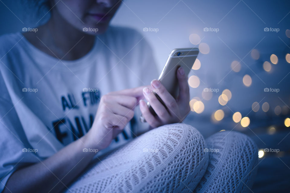 A lady using a mobile 