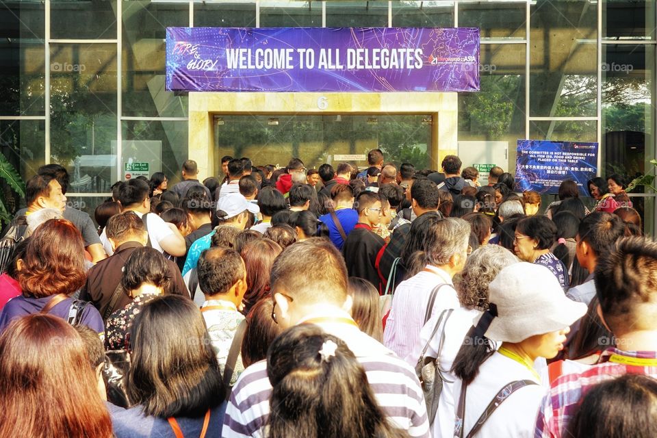 massive people queuing to enter the gate