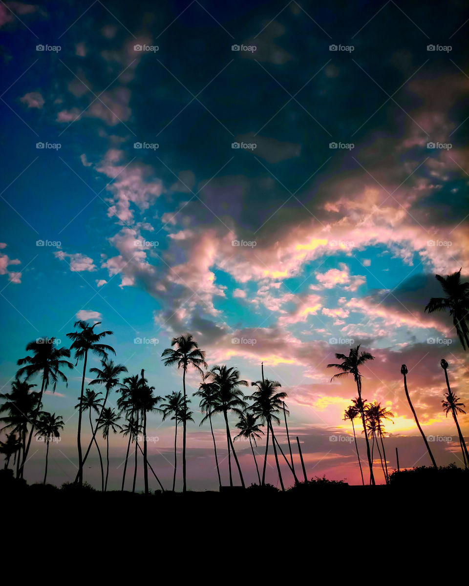 The sky erupts stunning rainbow colors during sunset in frenzy