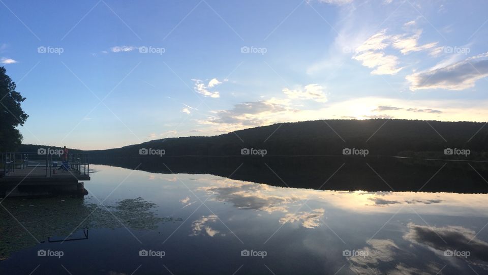 Lakeside Reflections. We spent a summer day at Sleepy Creek Lake in WV. The sky and the lake's reflection couldn't have been more perfect!