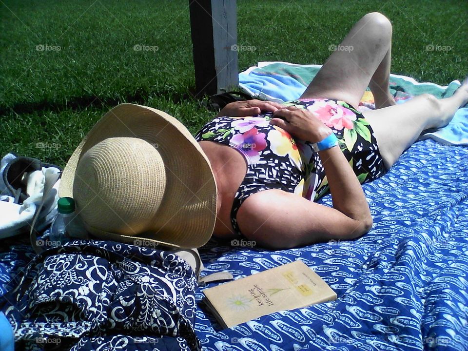 mom sunbathing...